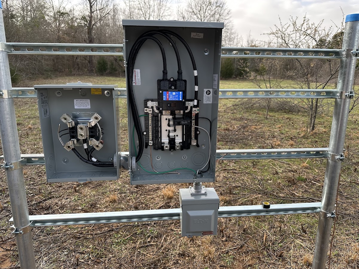 Meter base and panel mounted on a rural pole